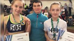 легкоатлеты